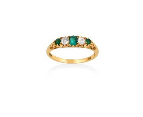 An Emerald and Diamond Five Stone Ringtwo old cut diamonds alternate with three emerald-cut emeralds, in yellow claw settings