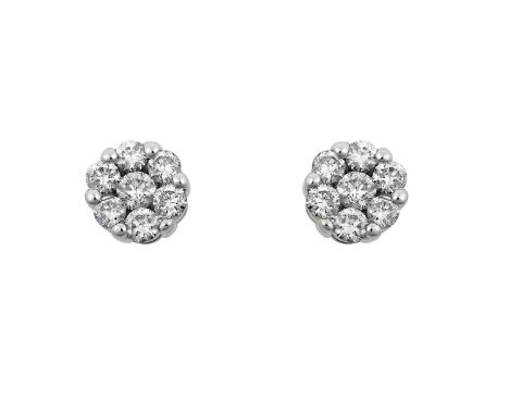 A Pair of 18 Carat White Gold Diamond Cluster Earringsthe central round brilliant cut diamond sat below a border of further r