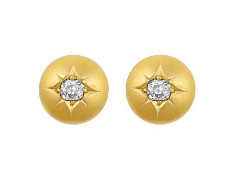 A Pair of Diamond Solitaire Earringsthe yellow domes inset with an old cut diamond, in star settings, total estimated diamond