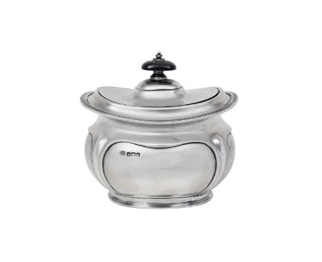 An Edward VII Silver Tea-Caddy,  by George Howson, Sheffield, 1909 oblong and with lobed sides, the hinged cover with part eb