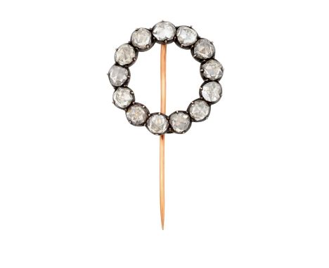 A Diamond Brooch the circular frame set throughout with rose cut diamonds, in white collet settings, total estimated diamond 