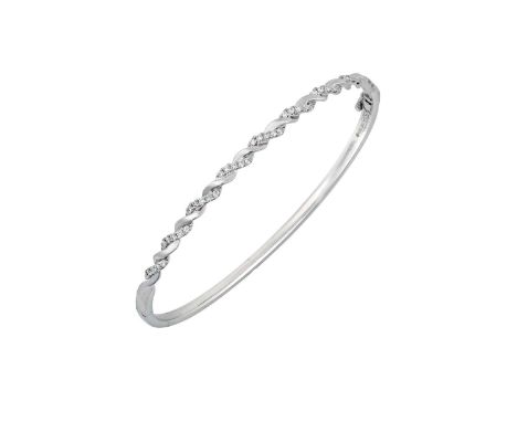 An 18 Carat White Gold Diamond Hinged Banglethe rope twist motif formed of a row of round brilliant cut diamonds in claw sett