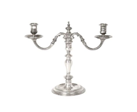 An Elizabeth II Silver Two Light Candelabrum,  by Wakely and Wheeler, London, The Branches 1983, The Base 1984 in the George 