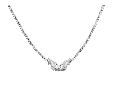 A Diamond Necklacetwo hands clutching a round brilliant cut diamond, with round brilliant cut diamond set cuffs, in white rub