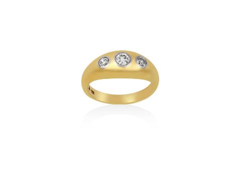 A Diamond Three Stone Ringthe graduated old cut diamonds in white rubbed over settings, to a yellow plain polished shank, tot