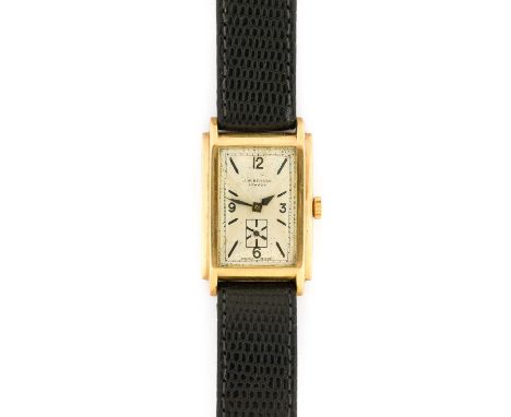 J W Benson: A 9 Carat Gold Rectangular Wristwatch, retailed by J.W.Benson, London, 1935, manual wound lever movement, silvere