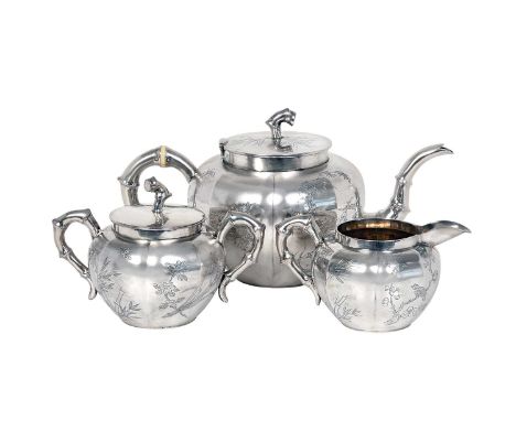 A Three Piece Chinese Export Silver Tea-Service,  With Artisan Workshop Mark for Ren An, Canton and Hong Kong, Retailed by Wi