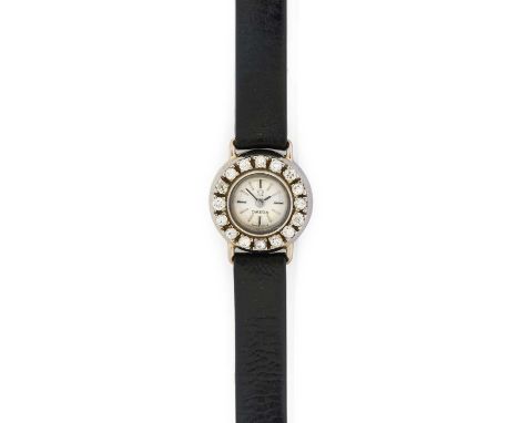 Omega: A Lady's 18 Carat White Gold Diamond Set Back Winding Wristwatch, signed Omega, circa 1968, manual wound lever movemen