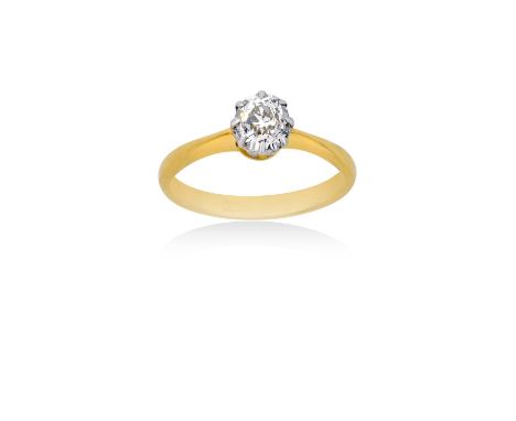 A Diamond Solitaire Ringthe old cut diamond in a white claw setting, to a yellow tapered shoulder plain polished shank, estim