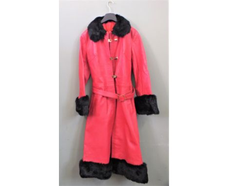 A fur trimmed red leather coat and a pair of flared Levi jeans (size 30" waist) and another pair of pink vintage Levis