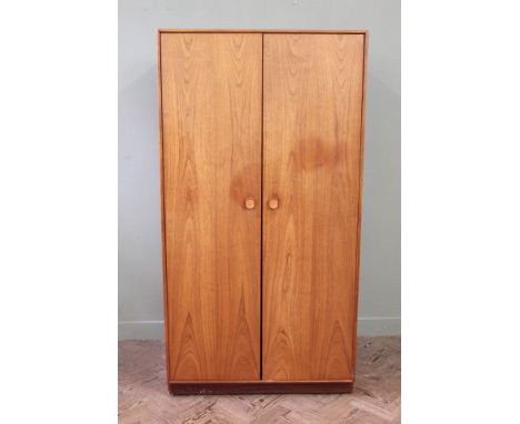 An Ercol double wardrobe