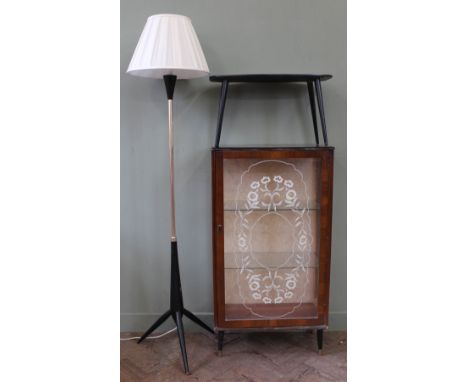 A 1960's black and gold standard lamp on tripod base, a small occasional table and a Parisian print