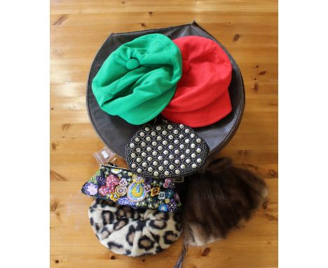 A collection of vintage hats, handbags and a hat box