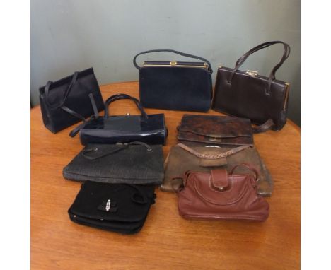 A box of vintage handbags
