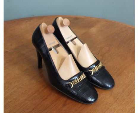 A pair of vintage Bally shoes, size 40 1/2 and shoe lasts and a pair of Rebeccas Sanver shoes, size 39 1/2 