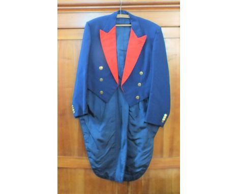 A vintage hunting jacket with tails and red lapels
