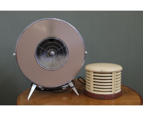 A circular heater and one other vintage heater (both sold as collector's items only)