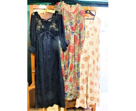 Three vintage lady's dresses, a mackintosh and two velvet jackets