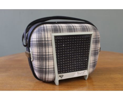 A Tourist Tepaz portable record player in the form of a handbag