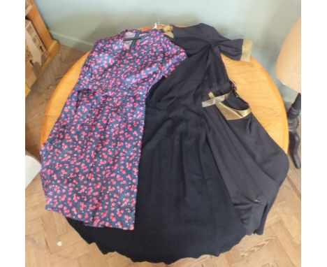 Three vintage dresses (two black and one floral)