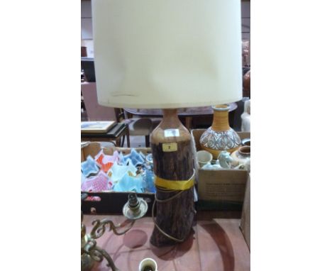 A treen table lamp. Signed to base