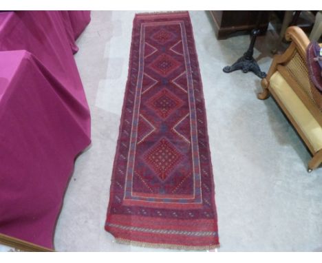 A Meshwani carpet runner. 2.41m x 0.62m