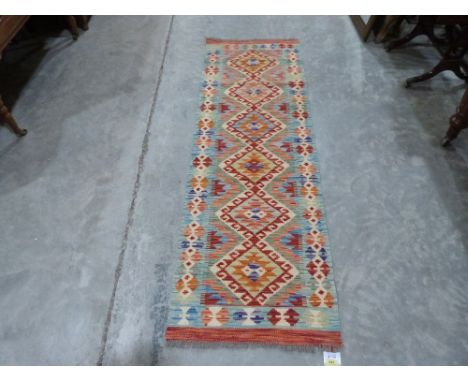 A Choli Kilim runner. 1.87m x 0.59m