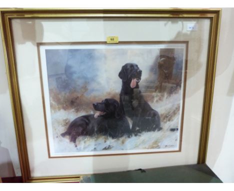 A framed print of black labradors after John Trickett. Signed. 16' x 20'
