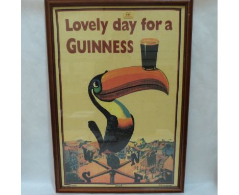 A framed Guinness print on textile, 'Lovely Day For a Guinness'. 30' x 20'