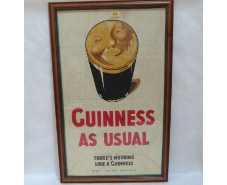 A 'Guinness As Usual' advertising print on textile. 29' x 17½'