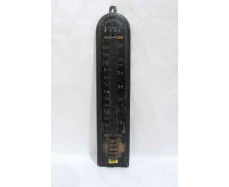 An exterior barometer. 25' high. Mercurial tube lacking
