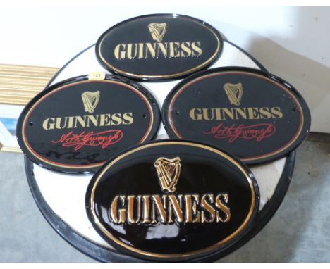 Four Guinness ceramic oval plaques