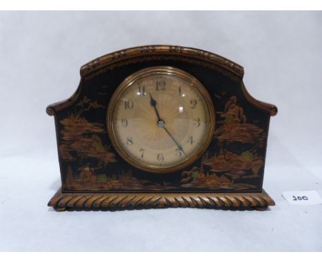 An early 20th century japanned mantle clock with French drum movement. 6¼' high