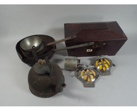 A Tray Containing Sarcophagus Tea Caddy for Restoration, Two AA Badges, Saucepans Kettle and A Razor Stropper. 