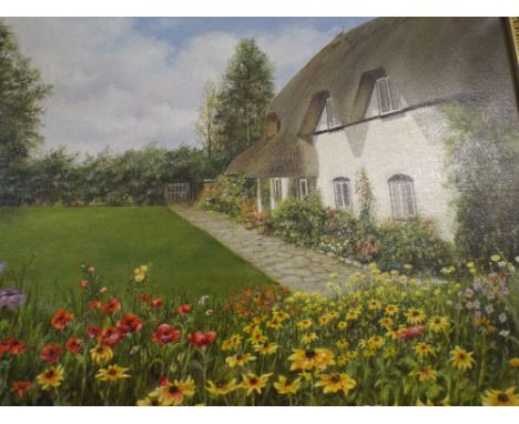A Framed Print of A Cottage and Garden.
