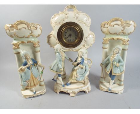 A Ceramic Clock Garniture The Clock with Some Losses.