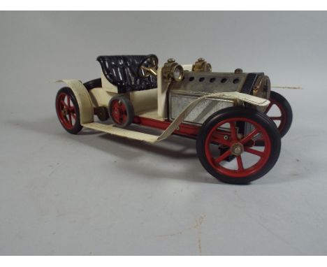 A Mamod Steam Driven Vintage Car.