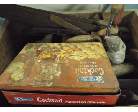 A Moonraker Milk Box Containing Various Tools. 