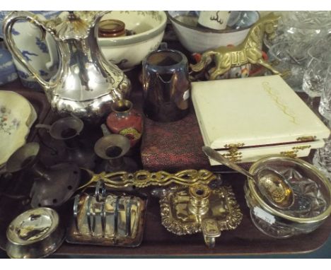 A Tray of Metal Ware to Include Silver Plated Jug, Toast Rack and Bed Chamber Stick, Cased Cutlery, Brass Rocking Horse, Cand