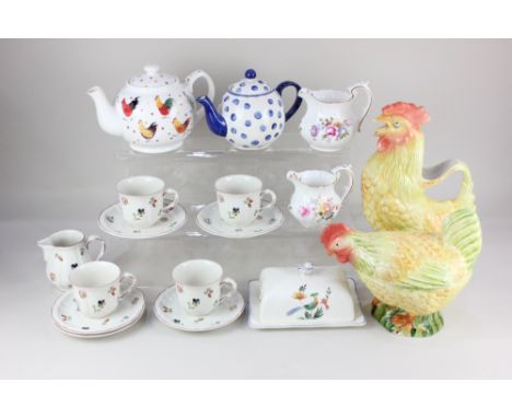 A Villeroy and Boch part tea set, with floral decoration on white ground, comprising milk jug, four tea cups and five saucers