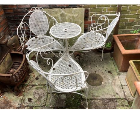 A French white painted garden three seat 'indiscretion' bench