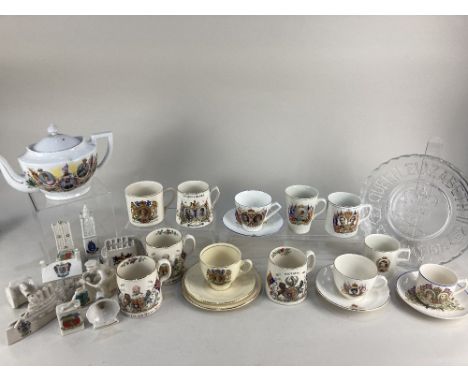 A group of commemorative wares including a Clarice Cliff Newport Pottery trio, Queen Elizabeth II coronation 1953, a Diplock,