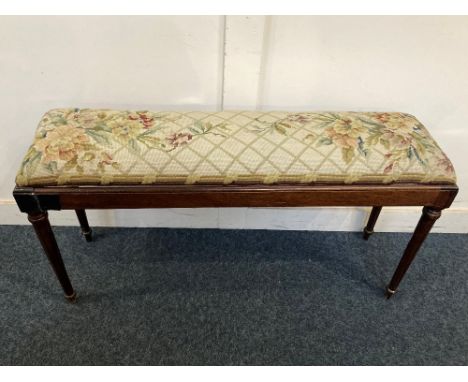 A mahogany framed window seat with rectangular upholstered tapestry top on fluted legs ( a/f repairs) 97cm