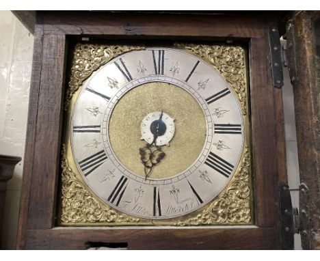 An 18th century oak longcase clock, the 11inch square dial, with silverised chapter ring (missing hand) and gilt spandrels, s