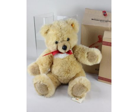 A Steiff Molly teddy bear, with ear button and maker's tags, 55cm high