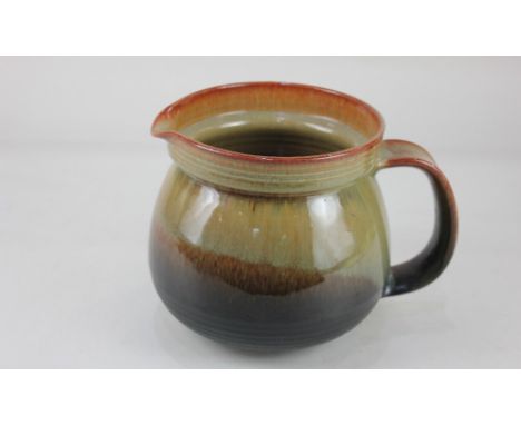 A Nanni Valentini for Ceramica Arcore ceramic pitcher, with brown glaze, marks and paper label to base, 16cm high