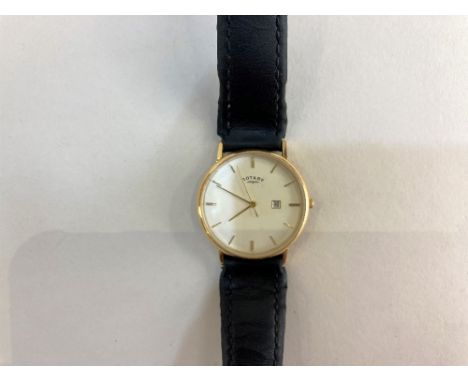 A gold plated Rotary watch with quartz movement, on black leather strap