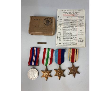 A set of four World War II medals, 1939-45 War medal, Italy Star, Africa Star, 1939-45 Star, and a First Army bar, in origina