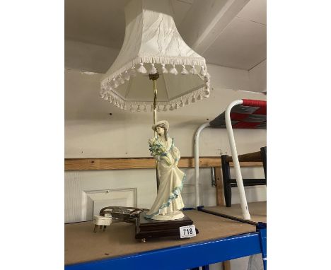 A figural table lamp 