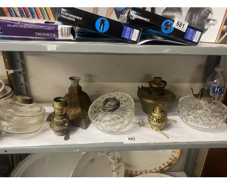 A quantity of oil lamp parts 